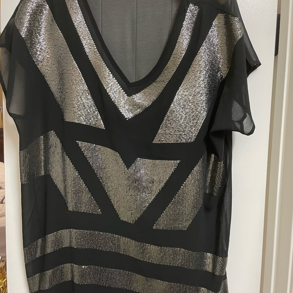 Black dressy sequined top 1x very nice comes with shirt underneath.